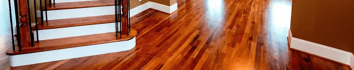 Base floor of a staircase with professionally restored wood flooring in Bakersfield CA